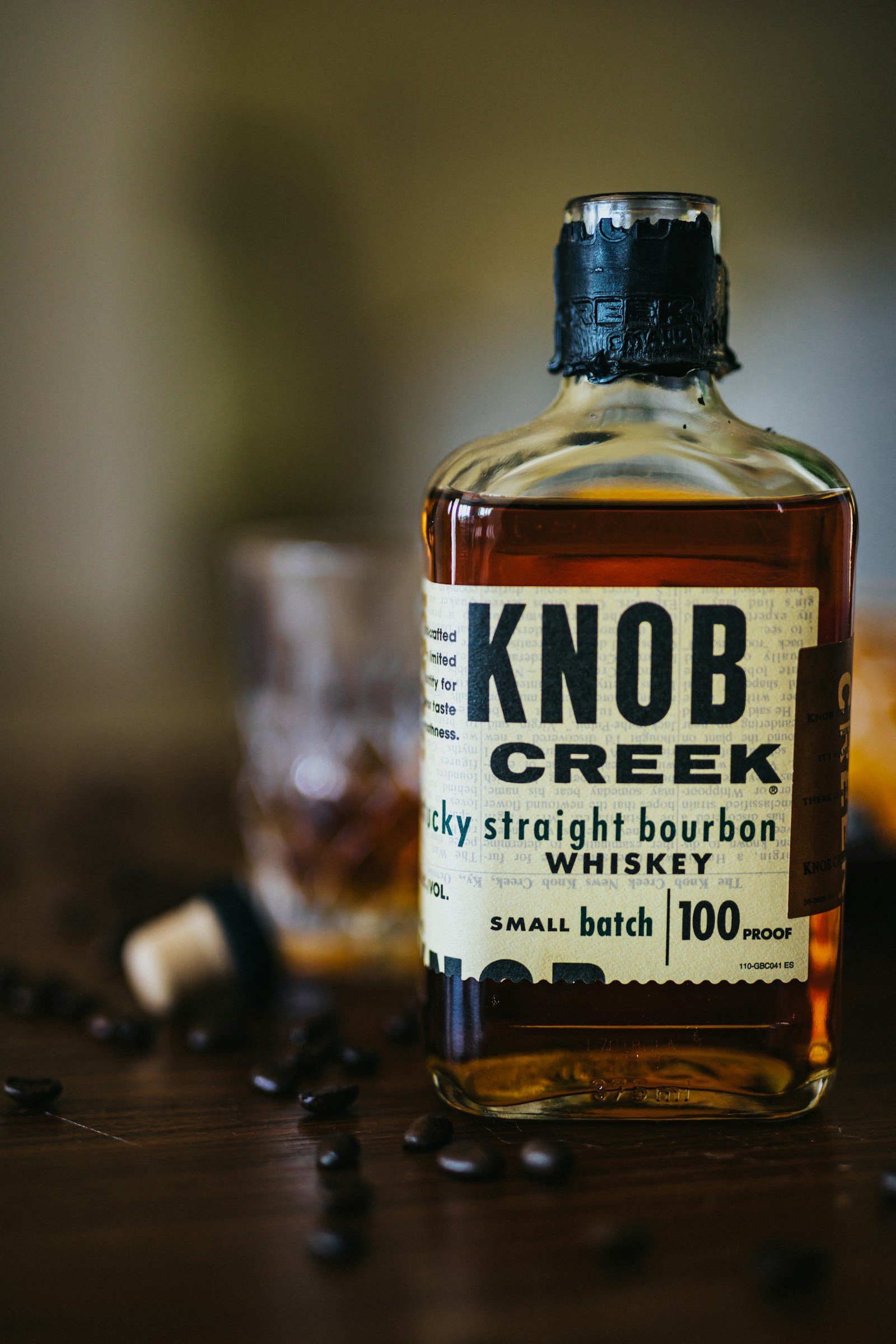 Knob Creek bourbon photographed on a table